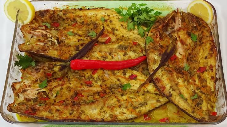 بتتبيلة مطاعم الأسماك السرية أعملي السمك السنجاري المشوي في الفرن بطعم وريحة جنان